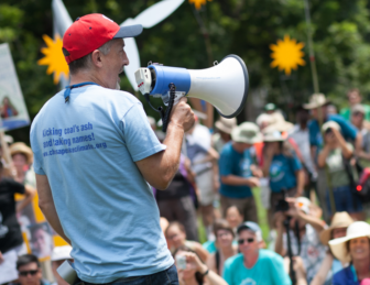 Mike Tidwell with megaphone at rally