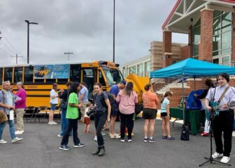 Folks gathered at the Vienna, VA Sun Day Celebration of school bus electrification
